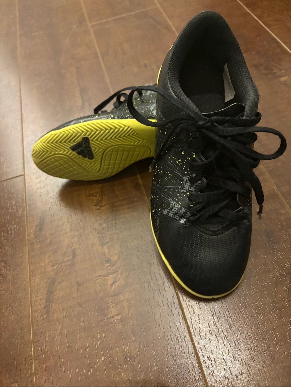 Black and Yellow Kids indoor soccer shoes.  Size 13.5 Addidas